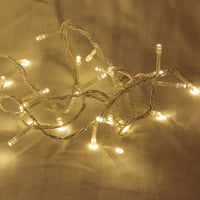 10 metre long fairy light string with warm white 100 bulbs - mains powered