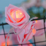 Pink roses table decoration or centrepiece - battery powered string fairy lights