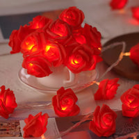 Red roses table decoration or centrepiece - battery powered string fairy lights