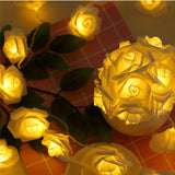 White roses table decoration or centrepiece - battery powered string fairy lights
