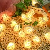 White roses table decoration or centrepiece - battery powered string fairy lights