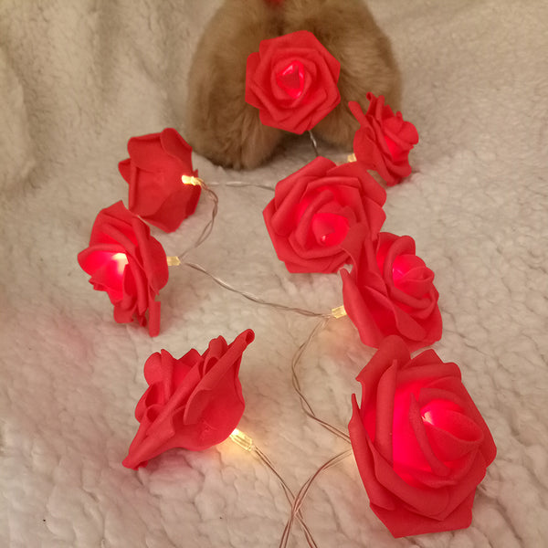 Red roses table decoration or centrepiece - battery powered string fairy lights