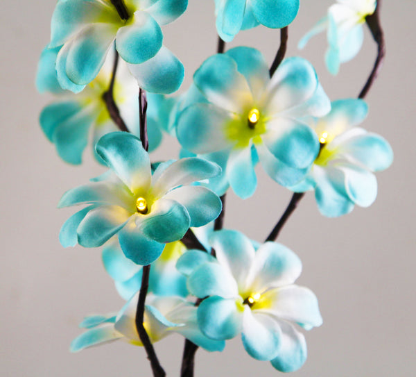 Tropical Blue Frangipani flower bunch on stems sticks - 50 cm high battery powered table centrepiece fairy lights
