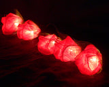 Red roses table decoration or centrepiece - battery powered string fairy lights