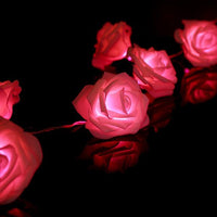 Red roses table decoration or centrepiece - battery powered string fairy lights