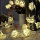 White roses table decoration or centrepiece - mains powered string fairy lights