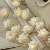 White roses table decoration or centrepiece - battery powered string fairy lights